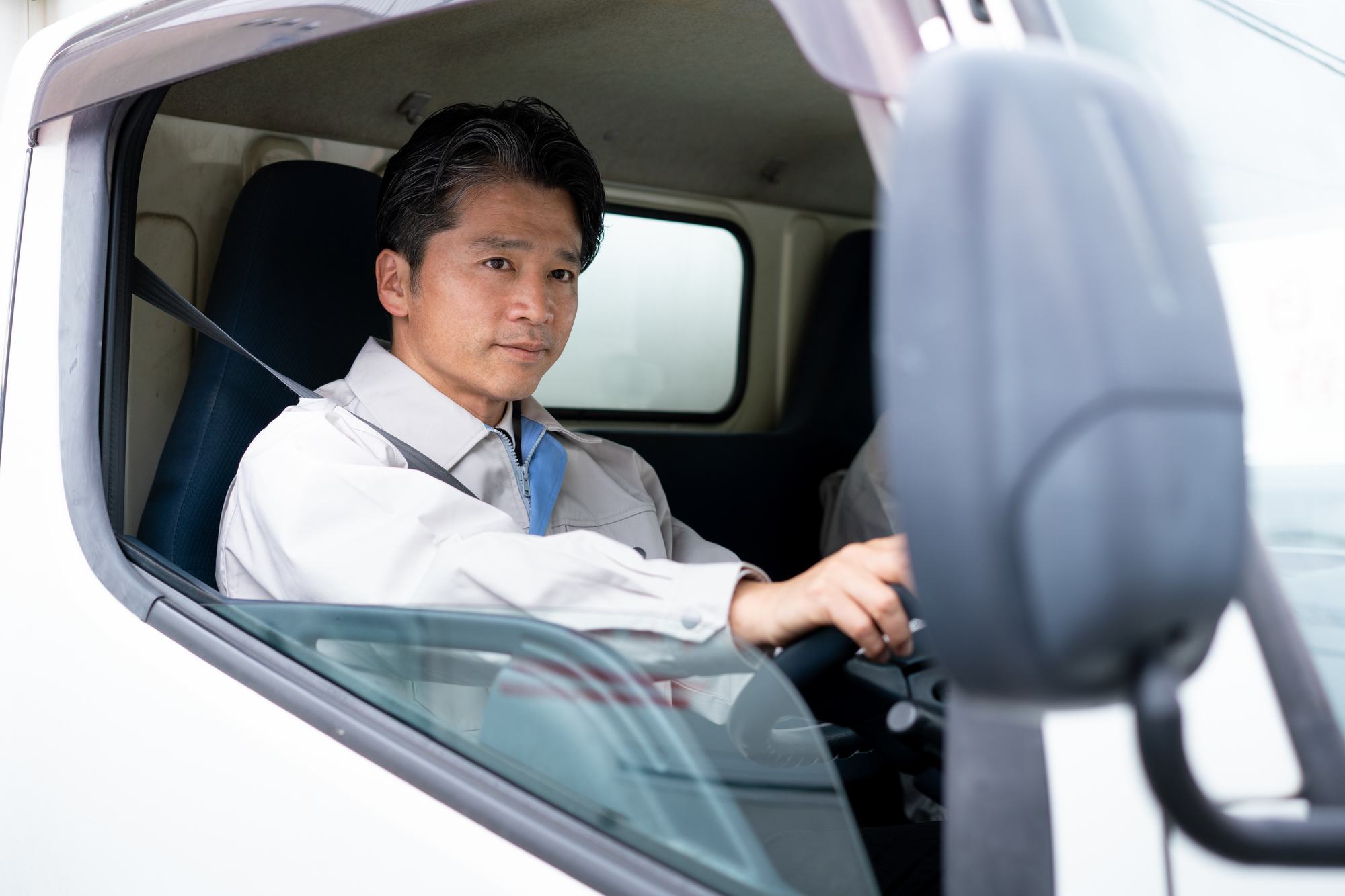 ダンプ及びトレーラー運転手（兼務）